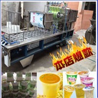 塑料杯裝豆?jié){灌裝封口機(jī) 豆?jié){包裝機(jī) 塑料杯包裝機(jī)圖片_高清圖_細(xì)節(jié)圖-溫州市甌海梧田進(jìn)誠機(jī)械廠 -